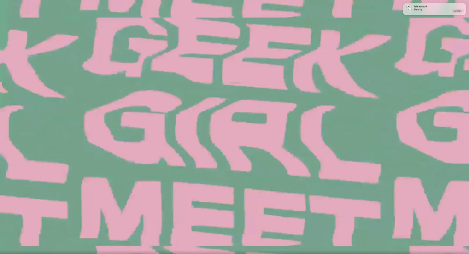 Pink "Geek Girl Meetup" lettering, stretched and repeated across a green background.